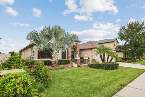 Photo of 2229 Gwynhurst Boulevard, Wesley Chapel, FL 33543 (MLS # O6445805)