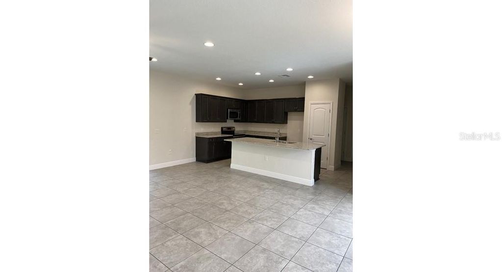 Photo of 7724 Swiss Avenue, North Port, FL 34291 (MLS # OM721072)