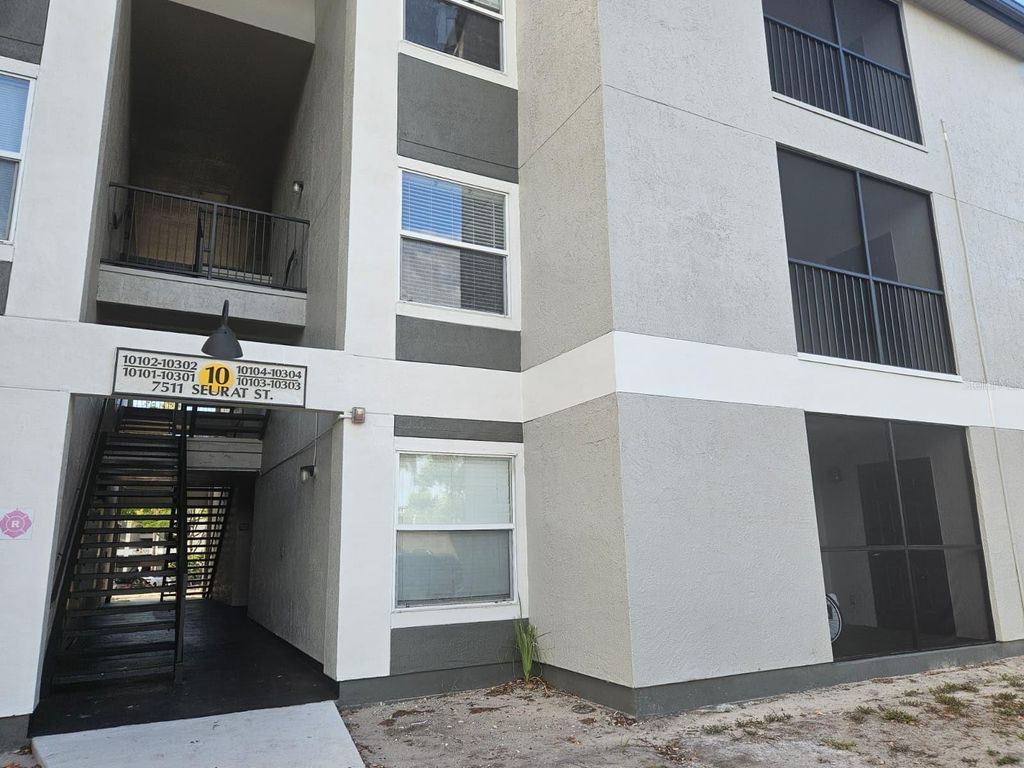 Photo of 7511 Seurat Street #10203, Orlando, FL 32819 (MLS # O6410804)