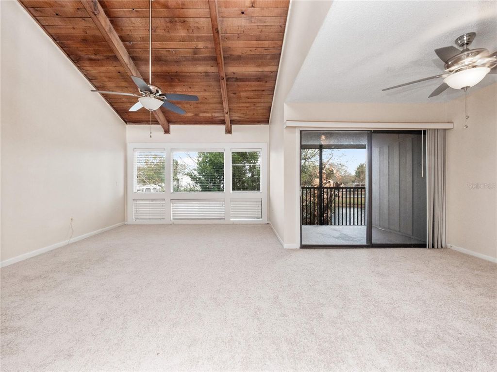 Photo of 5789 Peregrine Avenue #30-C10-2, Orlando, FL 32819 (MLS # O6387239)