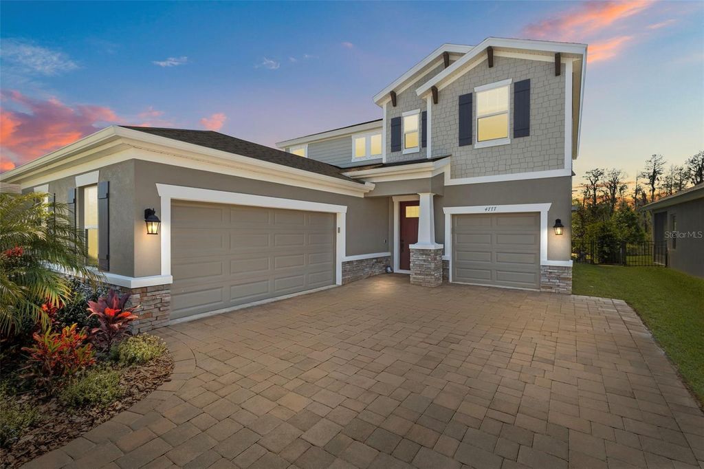 Photo of 4777 Ballantrae Boulevard, Land O Lakes, FL 34638 (MLS # TB8366390)