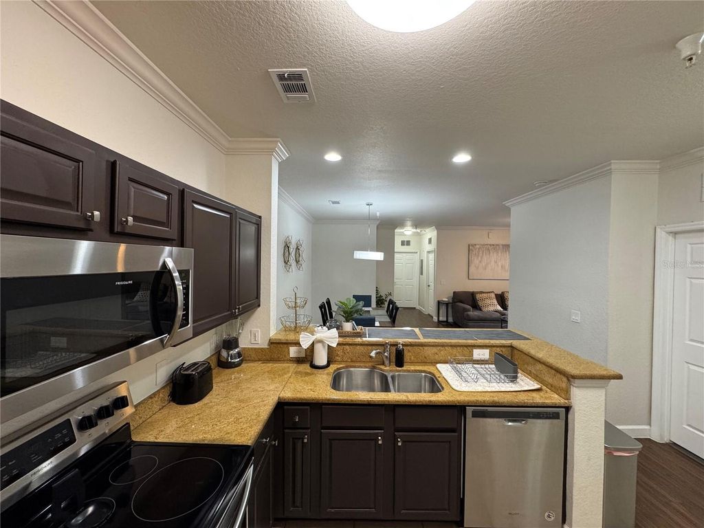 Photo of 1361 Tuscan Terrace #7104, Davenport, FL 33896 (MLS # O6404737)