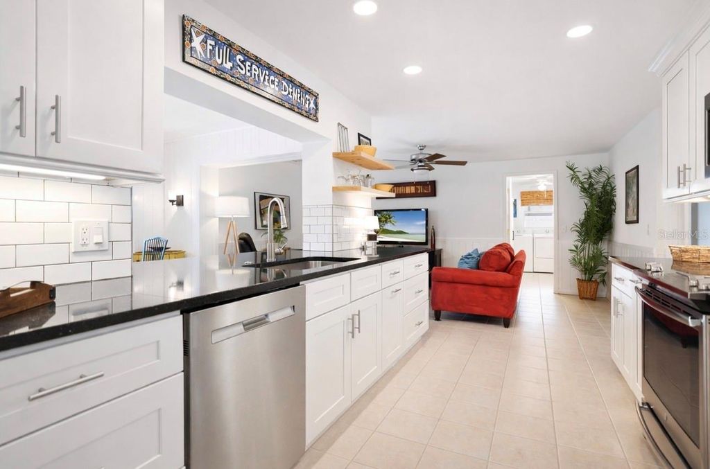 Photo of 2353 Demaret Drive, Dunedin, FL 34698 (MLS # TB8481635)