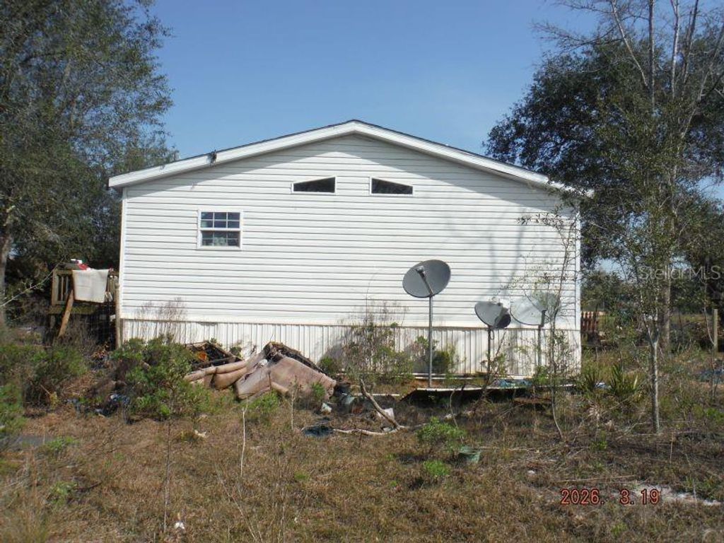 Photo of 748 Greyhound Lane, Youngstown, FL 32466 (MLS # TB8496339)