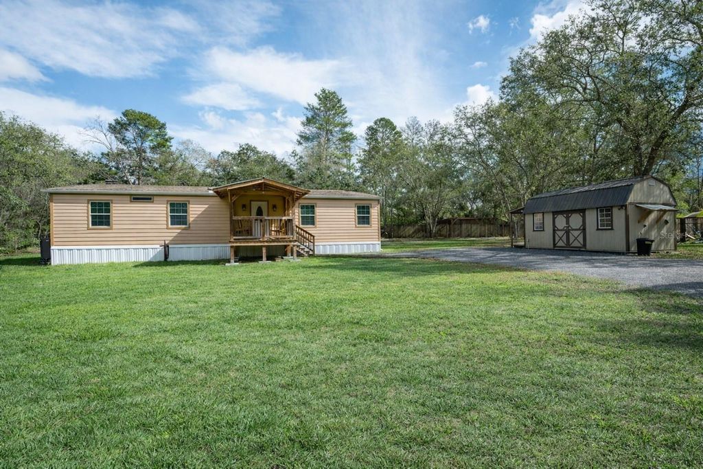Photo of 13433 Tommy Trail, Hudson, FL 34669 (MLS # TB8471180)