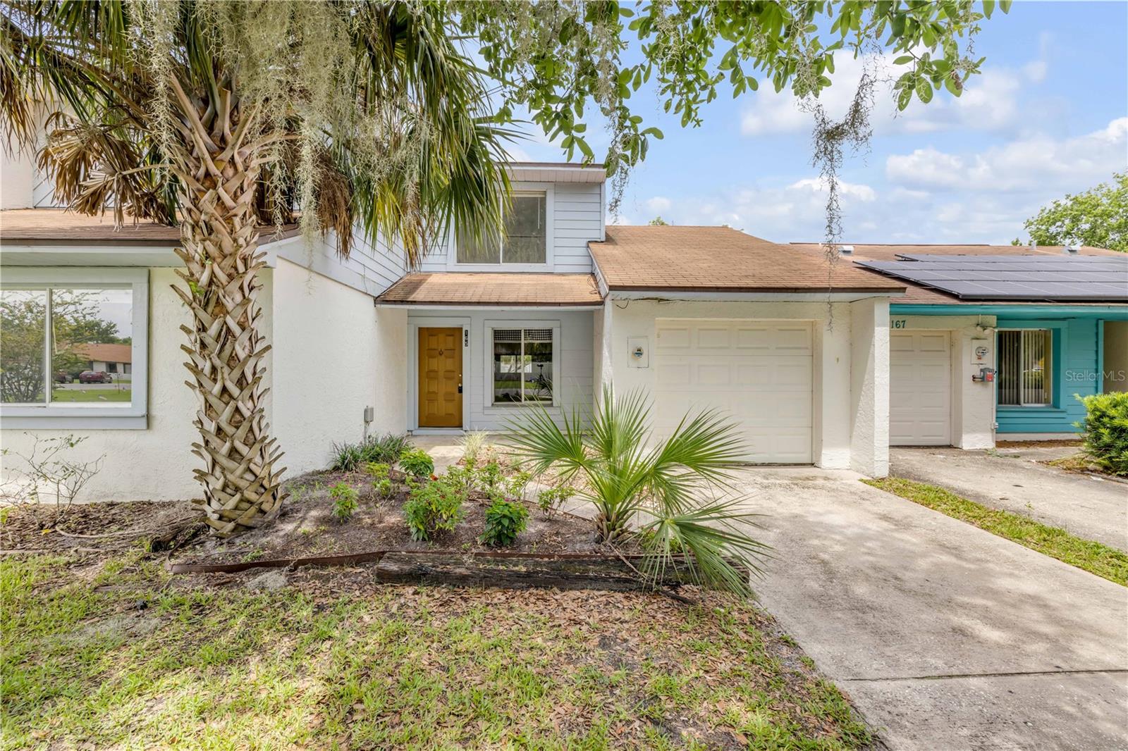 Welcome to this beautifully maintained 3-bedroom, 2-bathroom townhome in the desirable Hidden Lake Villas community with a private fenced back yard. This light-filled home features high vaulted ceilings and updated flooring in all bedrooms, creating an open and airy living space. Both bathrooms have been upgraded with modern tile, adding comfort and style. Enjoy the Florida lifestyle just steps from your front door with access to a sparkling community pool, tennis courts, pickleball, basketball court, playground, outdoor workout area, picnic space, and a serene catch-and-release fishing pond. With a low HOA fee, this home offers incredible value and convenience—located minutes from Orlando-Sanford International Airport, SunRail, major highways, and a wide range of shopping and dining options. Zoned for top-rated Seminole County schools, this townhome is the perfect blend of location, lifestyle, and livability.