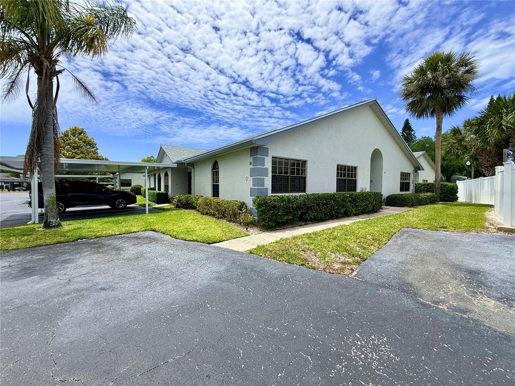 Photo of 2749 Countryside Boulevard #14, Clearwater, FL 33761 (MLS # TB8501921)