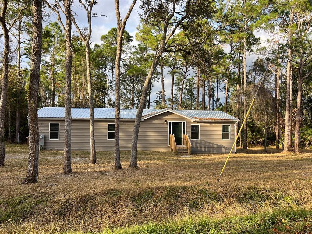 Photo of 44645 Twilight Trail, Deland, FL 32720 (MLS # V4946152)