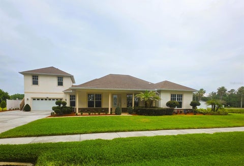 Photo of 6402 Barcellona Road, Land O Lakes, FL 34637 (MLS # W7885606)