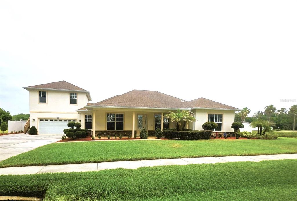 Photo of 6402 Barcellona Road, Land O Lakes, FL 34637 (MLS # W7885606)