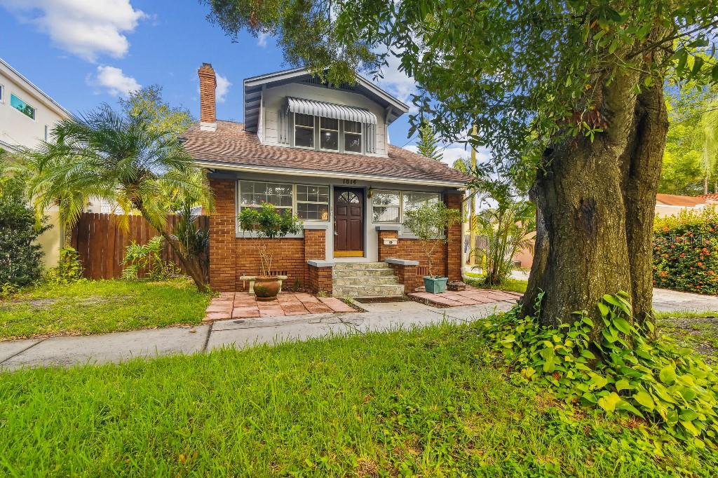 We invite you to see this spacious and charming Old Northeast residence featuring high ceilings, lots of natural sunlight and a lovely wood burning fireplace. The spacious kitchen features beautiful white cabinets and elegant stone countertops. Recent updates include new interior paint throughout, refinished ceilings and modern recessed lighting. The house exterior has just received a fresh coat of paint. The original wood floors have been refinished throughout. The interior walls are completed in a refreshing coastal palate. The three bedrooms are generous in size and feature walk-in closets. All bedrooms allow for a terrific view of lush green treetops from every window. The new owner will appreciate the luxury of a roomy inside laundry located right off the kitchen, and a courtyard style backyard that serves as your own private garden oasis. Located in Historic Old Northeast, you are walking distance to downtown St. Pete, waterfront parks, restaurants, and local shops. Never worry about loss of power, because the home is outfitted with a 24kw Generac standby generator. This home is a perfect blend of classic architectural charm with all the modern conveniences. Don’t miss your opportunity to experience the coveted downtown St. Pete lifestyle!