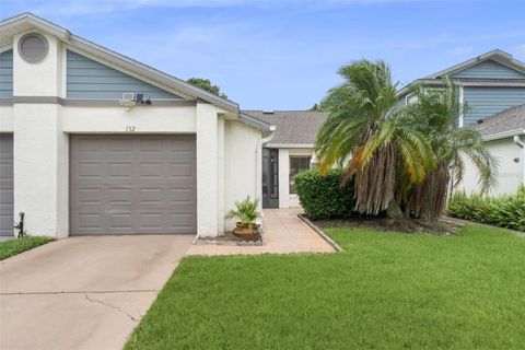 Photo of 152 Lakepointe Circle, Kissimmee, FL 34743 (MLS # O6352210)