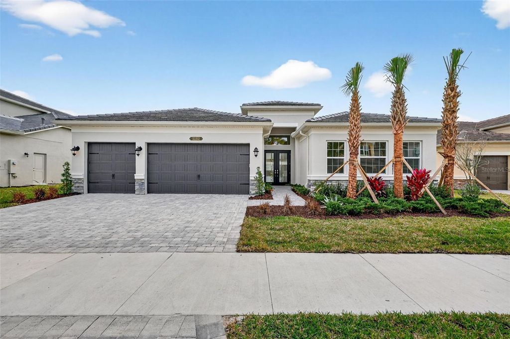 Photo of 32212 Mahogany Valley Drive, Wesley Chapel, FL 33543 (MLS # TB8368101)