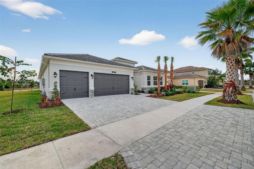 Photo of 32212 Mahogany Valley Drive, Wesley Chapel, FL 33543 (MLS # TB8368101)