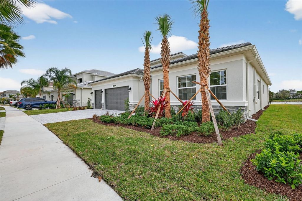 Photo of 32212 Mahogany Valley Drive, Wesley Chapel, FL 33543 (MLS # TB8368101)