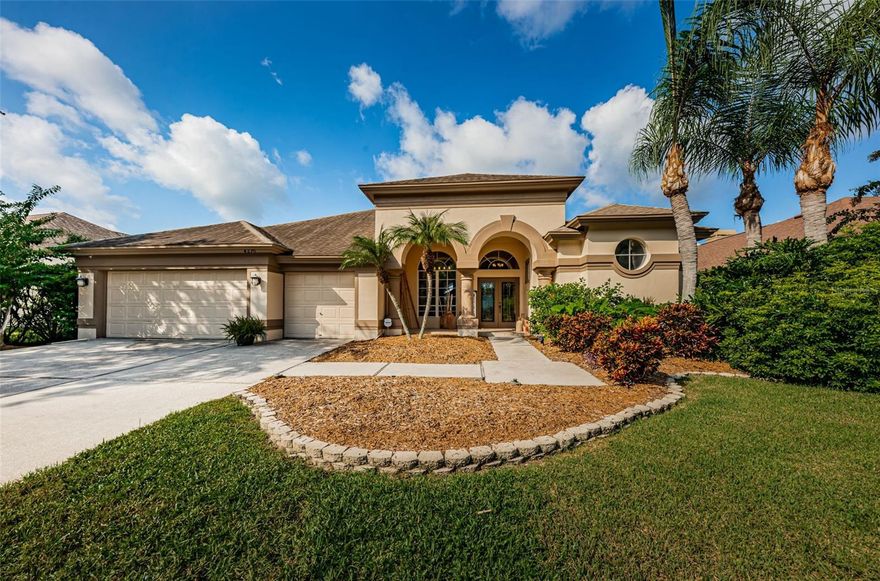 This lovely 4 bedroom/3 bath home is located in Aylesford, one of Lansbrook’s most desirable subdivisions. The split bedroom layout includes a formal living room/dining room, gourmet style kitchen, and a family room. The Island kitchen is equipped with loads of features including: a large breakfast bar, as well as a window front dinette area. The Family Room features a wood burning fire place, volume ceilings, and an abundance of natural lighting. The home has numerous glass doors that lead out to the screen enclosed lanai pool deck area. The garage offers lots of storage space for vehicles as well as recreational toys. The Lansbrook community offers numerous amenities, such as: a Public Golf Course, a YMCA, a Recreation park with volleyball/basketball courts, as well as a boat ramp park with direct access to Lake Tarpon. This is one of those homes with too many features to list, you really must see it for yourself. Please click on the virtual tour link for additional photos