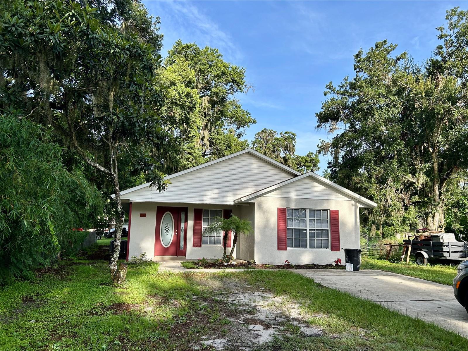 This lovely home is situated in the heart of Wauchula, close to shopping, restaurants and medical facilities. The home features an open floor plan with expansive views from the front door into the living room, dining room and kitchen, perfect for entertaining. The two guest bedrooms share one side of the home and the primary bedroom and bath occupy the other side, offering privacy. A sizable back yard affords plenty of room for relaxing and play. The roof was replaced in June 2025.