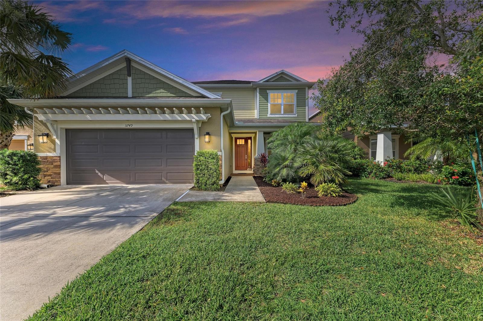 Welcome to your Florida dream home in the highly sought-after Arbor Lakes on Palmer Ranch! This stunning 4-bedroom + bonus room, 3-bath residence offers almost 2,700 square feet of beautifully designed living space with modern finishes and an open-concept layout perfect for entertaining. As you walk in you are greeted with the high ceilings, natural light, and a cat walk overlooking the main living area. The gourmet kitchen features granite countertops, stainless steel appliances, gas cooktop, a spacious island, eat in kitchen area, and walk-in pantry, all flowing seamlessly into the living and dining areas.
Upstairs, you'll find a generous primary suite with a ensuite bath, double vanities, and a large walk-in closet, along with a versatile bonus room ideal for a home office, playroom, or media space. Enjoy indoor-outdoor living with sliding doors that open to a covered lanai and private backyard with lush landscaping—perfect for relaxing or hosting gatherings. The added surround sound in the living area is perfect for your subtle ambiance of entertaining.
Located in an amenity-rich, family-friendly community with resort-style pool, splash park, playground, fire pit, sports courts, and dog park, and zoned for top-rated Sarasota schools, including Ashton Elementary and Sarasota Middle. Just minutes from Siesta Key Beach, shopping, dining, and Legacy Trail.
This is the Florida lifestyle you’ve been waiting for—schedule your private showing today!