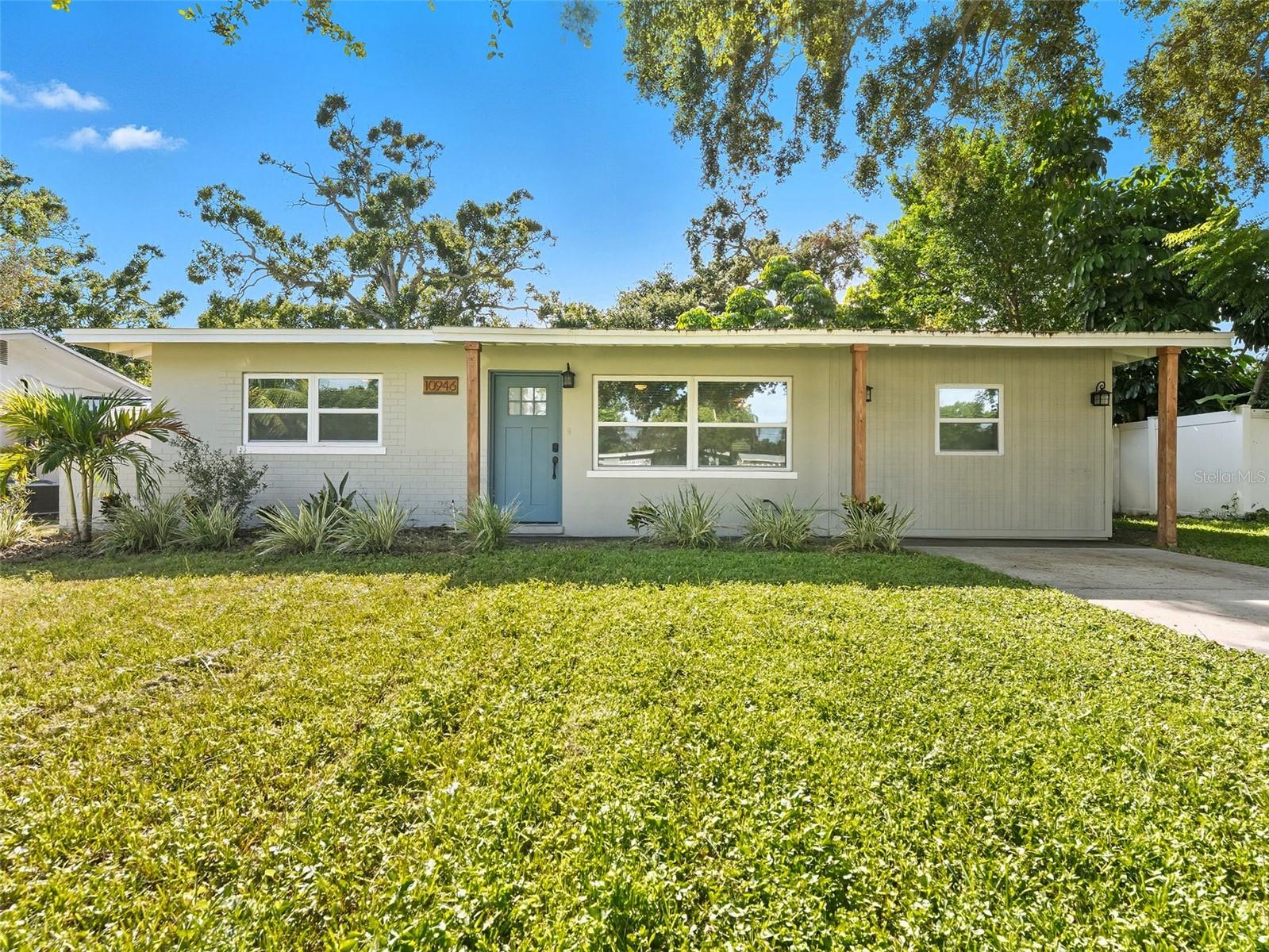 Welcome to this beautifully refreshed 3-bedroom, single-family home tucked in the heart of Largo. Inside, you’ll find new LVP flooring, fresh interior paint, and updated fixtures that bring a clean, modern feel. The kitchen is a standout with brand-new cabinets, sleek quartz counters, stainless steel appliances, and plenty of space for both storage and dining. A spacious living room, highlighted by an eye-catching accent wall, provides the perfect place to relax or entertain. The bathroom has been fully renovated with a contemporary vanity and a tiled shower/tub combination. Step through the back door to a covered porch overlooking a generous fenced yard—ideal for outdoor gatherings or simply unwinding. With its prime location near the Florida Botanical Gardens, beautiful parks, shopping, dining, and the Gulf beaches, this home offers both convenience and lifestyle.