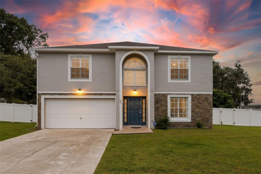Beautifully updated 4-bedroom, 3.5-bath home located in the desirable gated community of Magnolia Pointe! Built in 2006, this 3,010 sq ft residence features a bright, open floor plan with luxury vinyl plank flooring throughout, plantation shutters on every window, and abundant natural light. The spacious kitchen is a showstopper—complete with white shaker cabinets, quartz countertops, stainless steel appliances, and a large island perfect for entertaining. Upstairs, the impressive 17.5 x 20.5 primary suite offers a tray ceiling, spa-inspired ensuite bath with dual sinks, an oversized walk-in shower with built-in seating, and a massive walk-through closet. All bedrooms are located upstairs with a convenient half bath on the main level. Enjoy outdoor living in the screened patio overlooking the expansive vinyl privacy-fenced backyard.  Additional features include a 2 car garage with epoxy flooring, two HVAC systems (one replaced in 2021), updated lighting, City of Ocala utilities with public water and sewer, and an HOA that maintains the gated entry and common areas. Conveniently located near schools, shopping, dining, and major highways. Move-in ready and meticulously maintained—schedule your showing today!