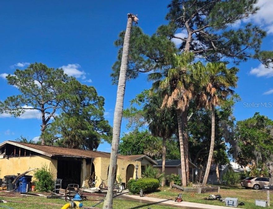 FIRE DAMAGE HOUSE. DO NOT ENTER. REDUCED PRICE SALE.