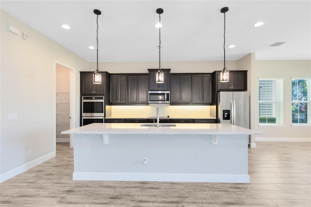 Photo of 8962 Lower Carrel Circle, Orlando, FL 32827 (MLS # O6368954)