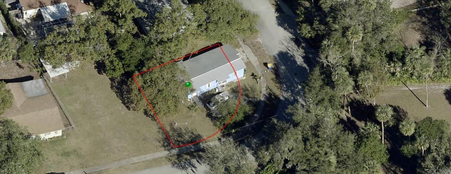 Prime investment opportunity just 6 minutes (2.2 miles) from beautiful **New Smyrna Beach!** Sitting on an expansive corner lot, this property is ideal for investors or builders ready to start fresh. The existing home is a full tear-down—perfect for new construction or redevelopment. With its unbeatable location and strong potential, this is your chance to create something exceptional near the coast!