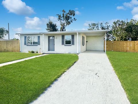 Photo of 21042 Gladis Avenue, Port Charlotte, FL 33952 (MLS # TB8373756)