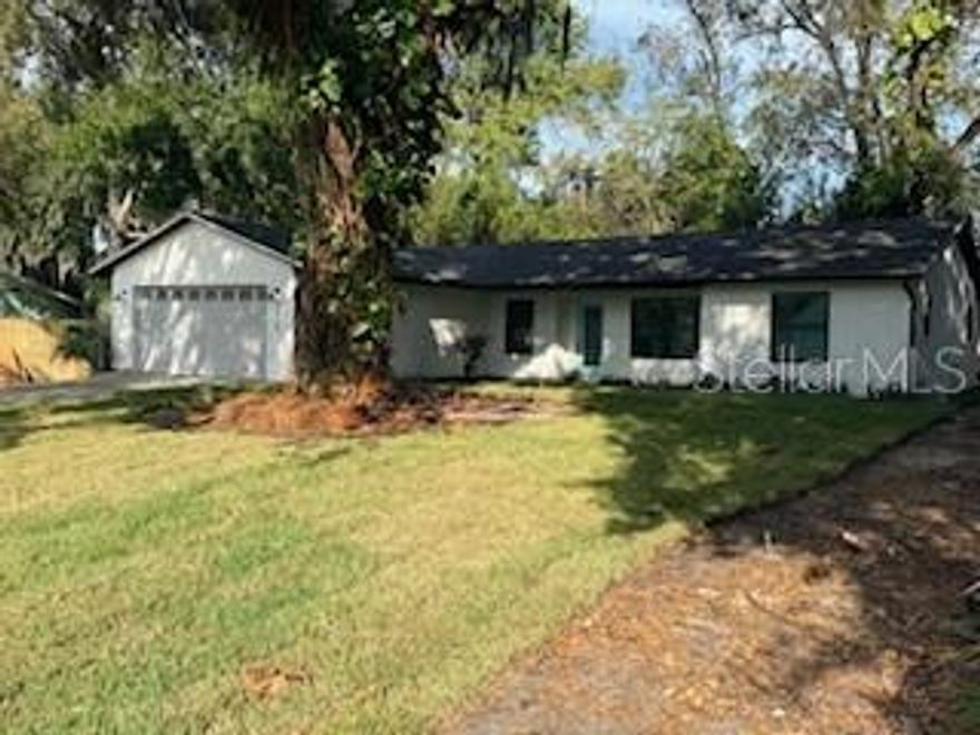 ***Professional Pictures Coming Soon***

Let your holiday dreams come true and make this completely renovated 3 bedroom, 2 bath, 2 car garage home your new home before the end of the year! The list of upgrades/updates is extensive. A new roof and new impact windows were installed in 2024. In 2025, the home was completely renovated with a new AC, new water heater, upgraded kitchen with soft close doors and drawers, brand new stainless appliances and beautiful granite counters. Throughout the home you will see attention to detail with new LVP flooring, upgraded trim and baseboards, new can lighting throughout and all ceiling fans controlled by remote. No need to worry about closet space with a huge walk-in closet in the primary bedroom and large closets in the secondary bedrooms, and a large indoor laundry room offers plenty of room for a walk-in pantry or additional storage. The freshly painted exterior and interior, transferable termite bond, freshly graded lot, and new sod make this home practically maintenance free. This home has never flooded and sits high and dry on a quiet, well-kept road. The seller is offering a $1500 allowance for buyers to use as they wish on additional landscaping, glass shower door, barn-door, etc. Also, the lot next door is available for purchase offering complete privacy if desired. Schedule your showing today and close before the holidays!