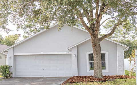 Photo of 6529 Tabogi Trail, Wesley Chapel, FL 33545 (MLS # TB8532561)