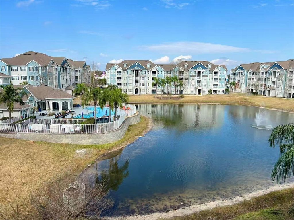 Photo of 5257 Cane Island Loop #402, Kissimmee, FL 34746 (MLS # O6380496)