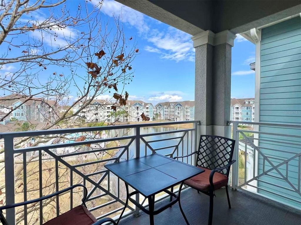 Photo of 5257 Cane Island Loop #402, Kissimmee, FL 34746 (MLS # O6380496)