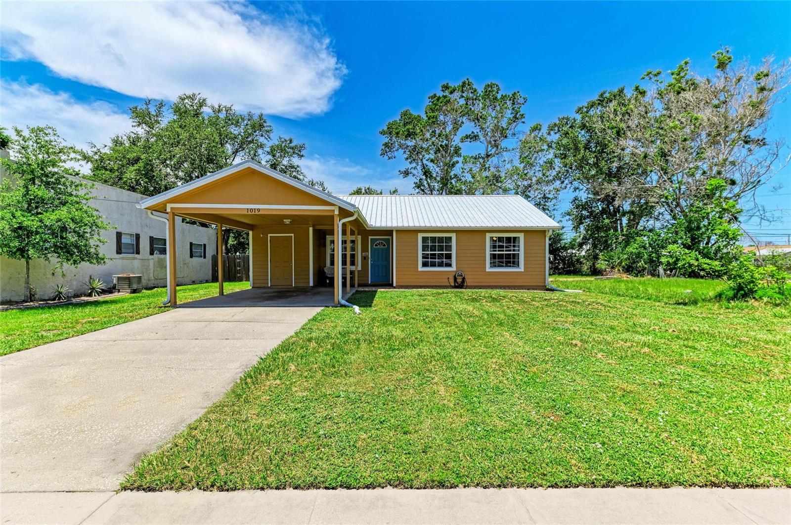 Well-maintained 3-bedroom home with large lot. This home has been freshly painted with hardy board siding outside and a new metal roof installed for long-term savings and security. The Eat-in kitchen features a new sliding door that opens to a screened porch, perfect for grilling or watching the family play in the large, fenced backyard. One bath opens from the hall and the primary bedroom—lots of closet space too. You'll be located on a quiet side street with great access to Emerson Point Preserve, the Manatee County Fairgrounds, or dinner in St. Pete. No deed restrictions and no past storm damage!