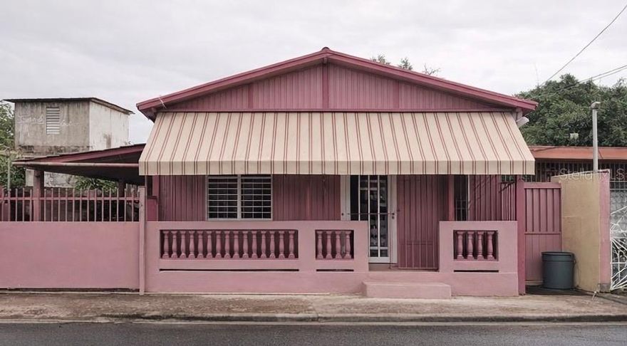 Ideally located just minutes from the heart of Guayama, this charming and impeccably maintained wood residence blends warmth, functionality, and exceptional convenience. Featuring 4 spacious bedrooms and approximately 1,008 square feet of living area, the home is in excellent condition and offers a comfortable layout designed for both everyday living and a relaxed island lifestyle. Set on a 197 m² lot, the property showcases a generous outdoor space with room for gardening, planting, or creating your own private oasis, along with a designated garage area for added convenience. Enjoy the perfect balance of tranquility and accessibility, just moments away from shopping, dining, schools, and major roadways. Property is being sold “as is.” A rare opportunity to own a well-kept home with character, space, and prime location in Guayama.