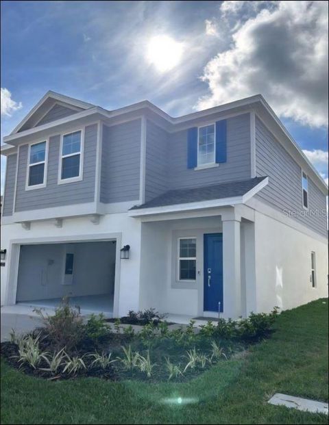 Photo of 323 Heroic Road, Davenport, FL 33837 (MLS # O6374823)