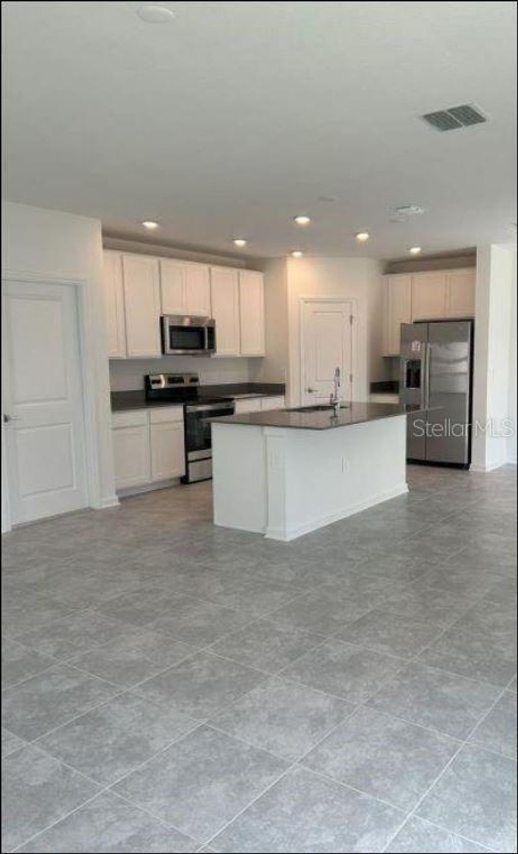 Photo of 323 Heroic Road, Davenport, FL 33837 (MLS # O6374823)