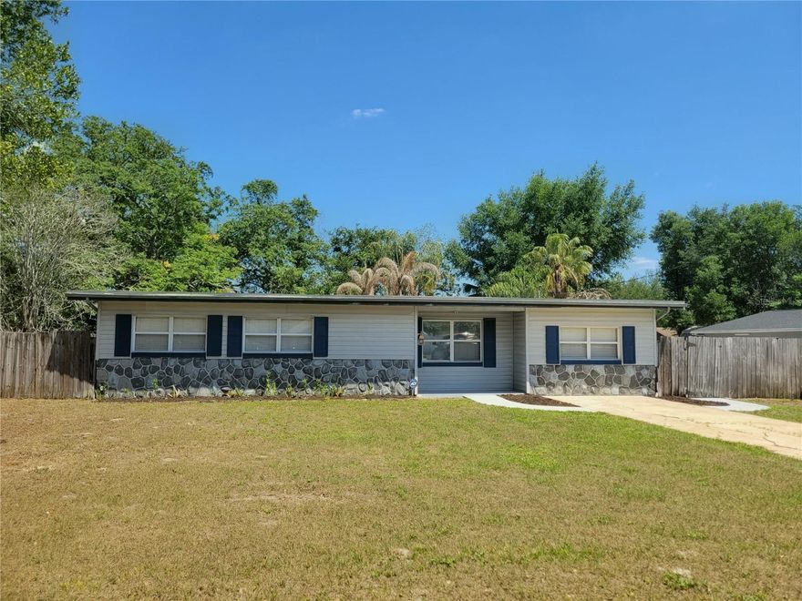 Get ready for your BEST summer ever with this 3/2 move-in ready pool home!  Huge kitchen, perfect for entertaining.  Ceramic tile throughout, jacuzzi bath tub, indoor laundry room, granite countertops, extra storage cabinets built in above closets. Block construction, city sewer, huge screened porch with doggie door. The possibilities are endless with a 250 sq ft block utility building and a 9x12 tiki bar (both with power and water).  Large fenced backyard is surrounded by tropical foliage that is growing back nicely after the freeze.  Proximity to attractions and highways make it a great choice for a fun Airbnb. Desirable schools including Boone High-Go Braves!