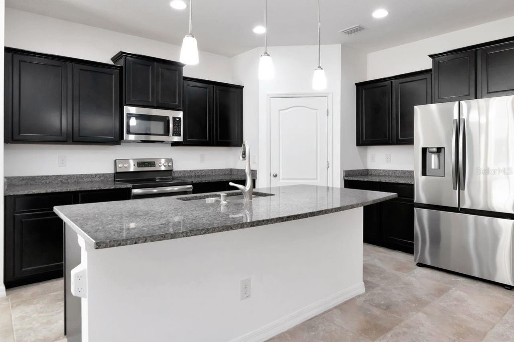 Photo of 5446 Suncatcher Drive, Wesley Chapel, FL 33545 (MLS # TB8475481)