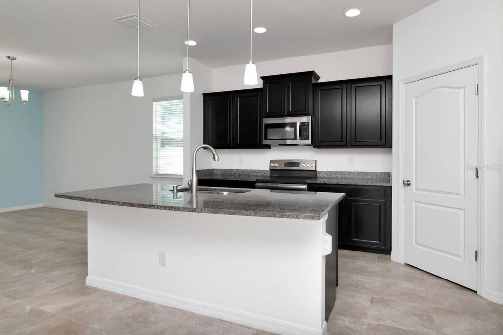 Photo of 5446 Suncatcher Drive, Wesley Chapel, FL 33545 (MLS # TB8475481)