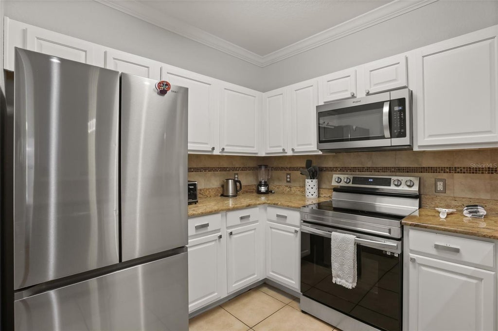 Photo of 1371 Tuscan Terrace #3404, Davenport, FL 33896 (MLS # O6451788)