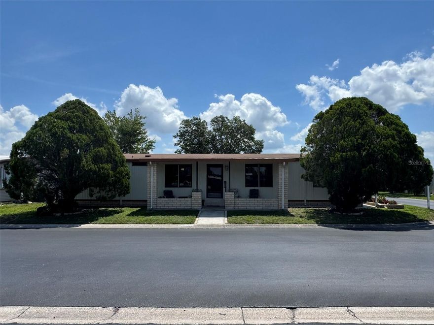 Generous size home within steps of the clubhouse!  The following major components have been replaced:  roof-2017, AC-2024, AC Ductwork-2025.  Vapor barrier was removed and a partial foam barrier was added but will need to be completed.  Home is in need of some TLC, however has potential. Timber Lake is a resident owned, gated community that is not age restricted. The very reasonable monthly HOA includes water, exterior maintenance along with 2 clubhouses with pools and a lake stocked with fish. The community holds many social events including bingo, line dancing and many more. Conveniently located near Publix, Home Depot and State Rd 56 leading to Wiregrass Mall, Costco and the outlet mall.