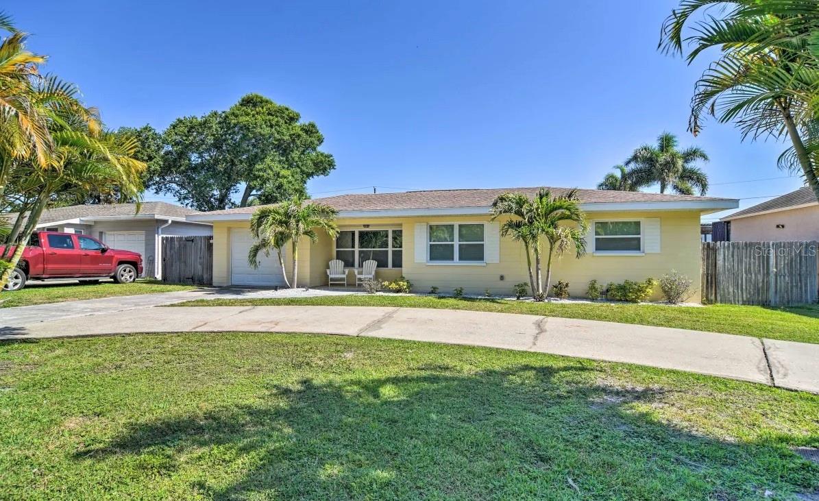 Welcome to your dream home in the heart of Seminole! This beautifully renovated 2-bedroom, 2-bath residence sits on a LARGE oversized lot in a NON-FLOOD ZONE, NON-EVACUATION ZONE, and with NO HOA—a rare combination offering both peace of mind and freedom. With plenty of space for a pool or future expansion, this home is perfect for creating the Florida lifestyle you've always wanted.
Step inside to discover a custom designer kitchen featuring stunning white shaker soft-close cabinets, upgraded Samsung appliances, a large single-basin sink, and gorgeous granite countertops with a high bar—ideal for hosting or enjoying a cozy dinner at home. Adjacent, a dry bar with a built-in wine fridge and elegant quartz countertops makes entertaining effortless. Throughout the home, you’ll find durable and stylish luxury waterproof vinyl flooring, complemented by ceramic tile in the bathrooms and bedrooms. The living room features a custom barn wood accent wall that adds charm and warmth, while recessed lighting and ceiling fans in each bedroom provide modern comfort. A programmable thermostat adds to the home’s energy efficiency and convenience, helping you stay comfortable year-round.
The backyard is truly a private retreat with a beautiful parklike setting, surrounded by white vinyl fencing for added privacy and security. Enjoy a spacious paver patio—perfect for relaxing evenings or entertaining guests. If it's a pool you desire, there's plenty of backyard space to make it happen.
Additional highlights include energy-efficient windows installed in 2023, a new roof included with purchase, a huge circular driveway, and an oversized garage with epoxy floors, ideal for storage, a workshop, or a home gym.
This home is zoned for all three top-rated Seminole schools, and the blue waters and white sands of the Gulf Beaches are just a short drive away. Plus, the home sustained no damage during the hurricanes of 2024, offering added security and confidence in your investment.
This is truly Florida living at its finest—see this magnificent home today and make it yours tomorrow, before someone else does!