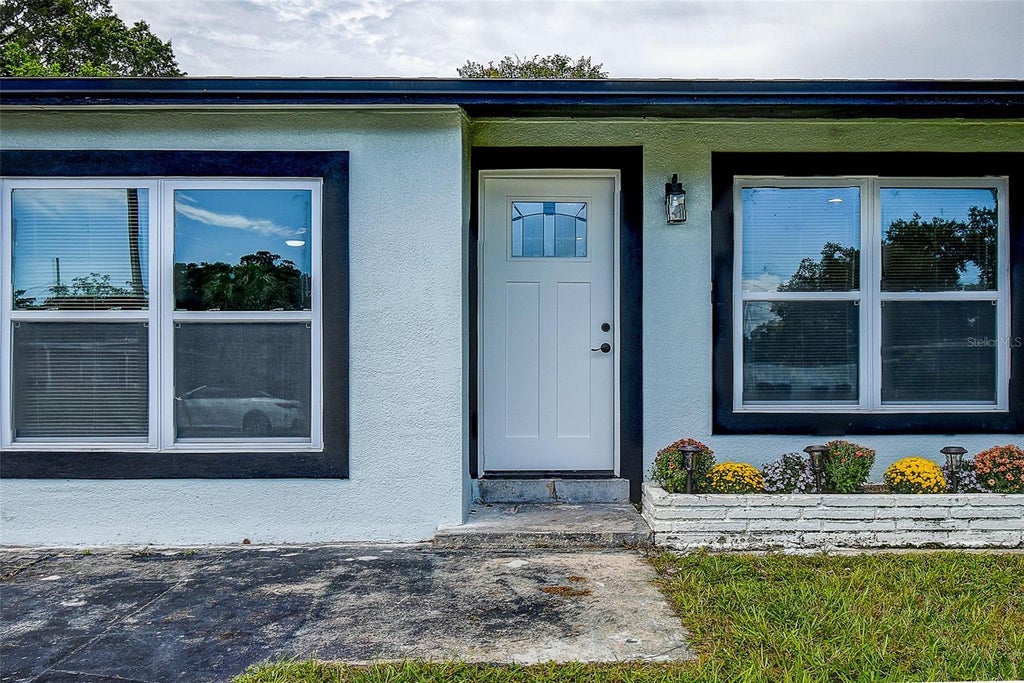Photo of 7580 Meadowlawn Drive N, St Petersburg, FL 33702 (MLS # TB8544206)