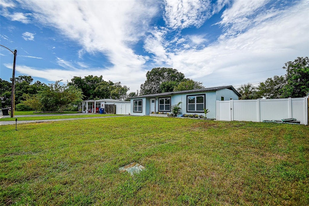 Photo of 7580 Meadowlawn Drive N, St Petersburg, FL 33702 (MLS # TB8544206)