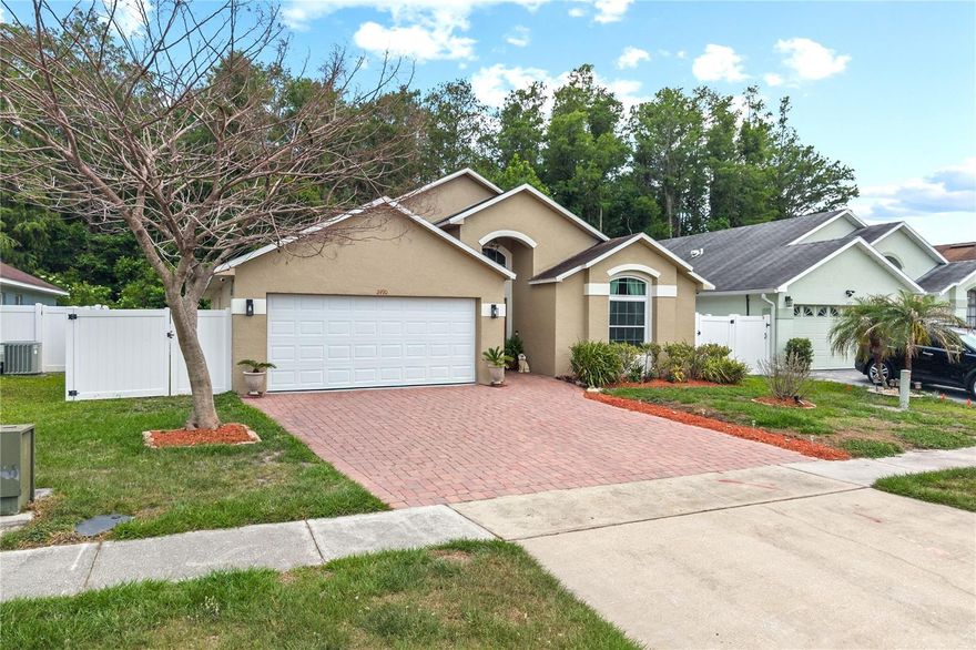 Welcome to this beautifully updated home located at 2490 Shelby Circle in the desirable Lakeside community! This well-maintained 3-bedroom, 2-bath residence perfectly combines style, functionality, and the Florida lifestyle.

From the moment you enter, you’ll appreciate the inviting layout featuring formal living and dining areas, a spacious open-concept family room, and a beautifully remodeled kitchen designed for both everyday living and entertaining. The upgraded kitchen features elegant quartz countertops, stainless steel appliances, decorative backsplash, recessed lighting, and ample cabinet and counter space.

Beautiful ceramic tile flooring installed throughout the home in 2018 adds durability and modern appeal. The spacious primary suite offers a fully remodeled bathroom with dual sinks, an oversized shower with glass enclosure, and updated finishes creating a relaxing retreat. Both bathrooms have been tastefully remodeled.

Enjoy outdoor living year-round in the covered lanai and paved patio area, perfect for gatherings and entertaining, all overlooking the newly fenced backyard for added privacy. Additional major upgrades include new windows and sliding glass doors replaced in 2024.

Residents of Lakeside enjoy fantastic community amenities including tennis courts, basketball courts, playgrounds, and scenic outdoor spaces. Conveniently located just minutes from the Florida Turnpike and SR-417, providing easy access to Orlando, Lake Nona Medical City, Orlando International Airport, world-famous attractions, shopping, dining, golf courses, parks, sports complexes, and entertainment.

Low HOA fee of only $300 annually! Whether you’re a first-time homebuyer, growing family, or investor, this exceptional property offers the perfect blend of comfort, convenience, and location. Don’t miss the opportunity to make this beautiful home yours!