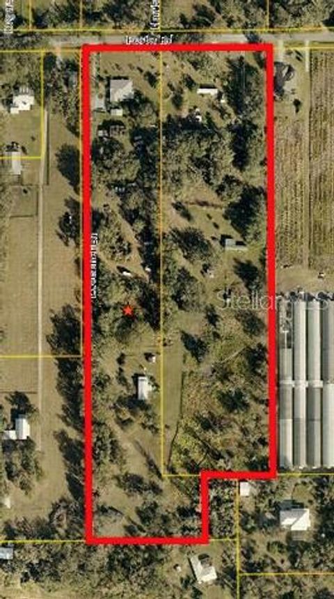 Photo of 10102 Loetscher Lane, Lithia, FL 33547 (MLS # TB8447885)