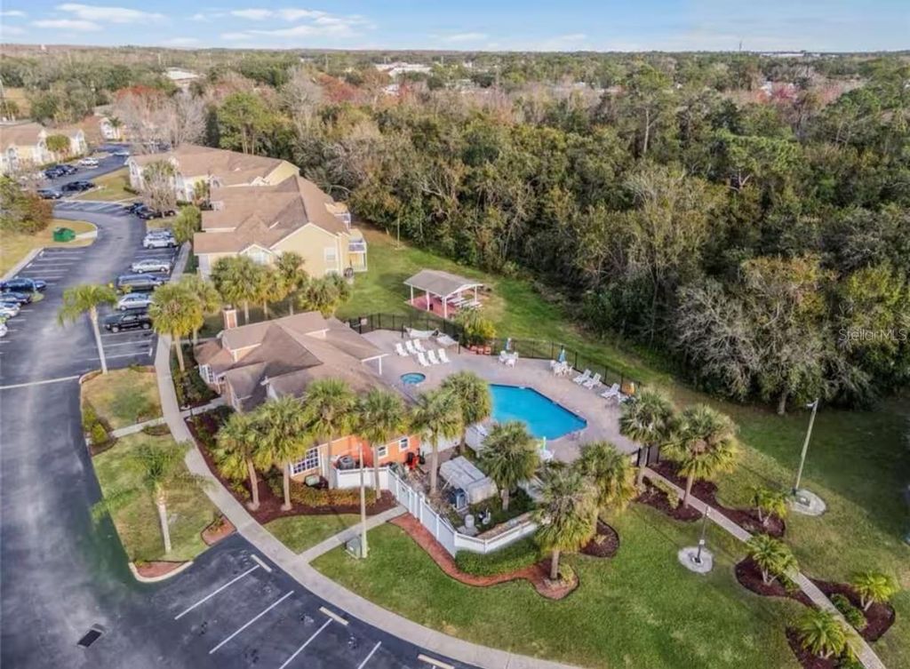 Photo of 2458 Sweetwater Club Circle #22, Kissimmee, FL 34746 (MLS # S5136235)