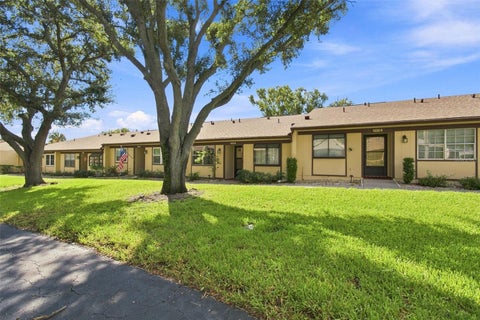 Photo of 11231 Dollar Lake Drive #4, Port Richey, FL 34668 (MLS # TB8546833)