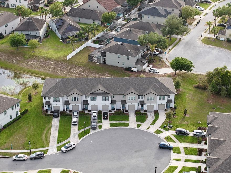 Welcome to this beautifully 3 bed/ 2.5 bath townhome for a premier living or investment opportunity in the highly desirable Enclave at Festival Resort. Built in 2022, this 1,640-square-foot residence features a modern open-concept layout with a spacious kitchen with stainless steel appliances and a large quartz island that flows seamlessly into the dining and living areas. With no rental restrictions, this property is uniquely suited for short-term rentals, long-term investments, or a primary residence. Nestled on a quiet U-shaped cul-de-sac, the residence offers added privacy and a peaceful atmosphere. The community is surrounded by scenic lakes and wooded areas, providing residents with access to a robust suite of amenitie, including a resort-style swimming pool and clubhouse., fully equipped fitness center, playground, and walking trail. Conveniently located close to ChampionsGate Town Center,  The home is  perfectly positioned for easy access to major theme parks, major theme parks, premier shopping and dining. Schedule a private showing today and make this beautiful home your new residence.