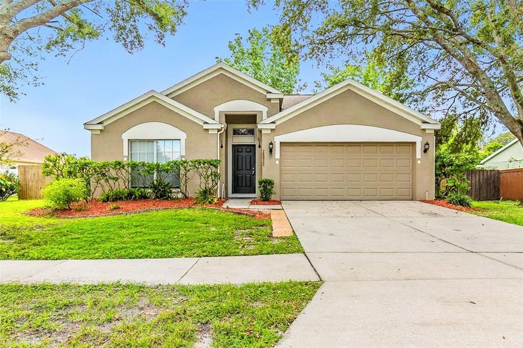 Photo of 26922 Carmen Place, Lutz, FL 33559 (MLS # O6327825)